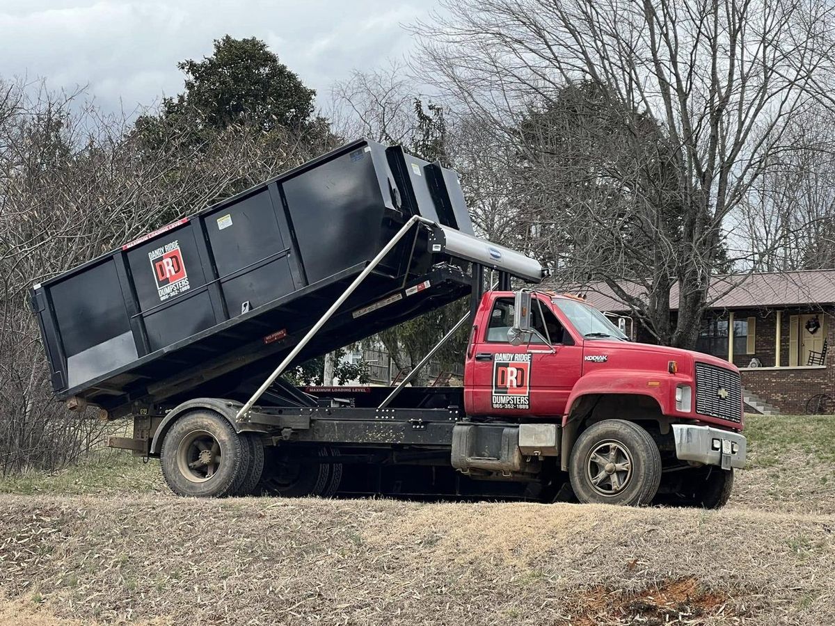 Dandy Ridge Dumpsters truck making a curbside pickup
