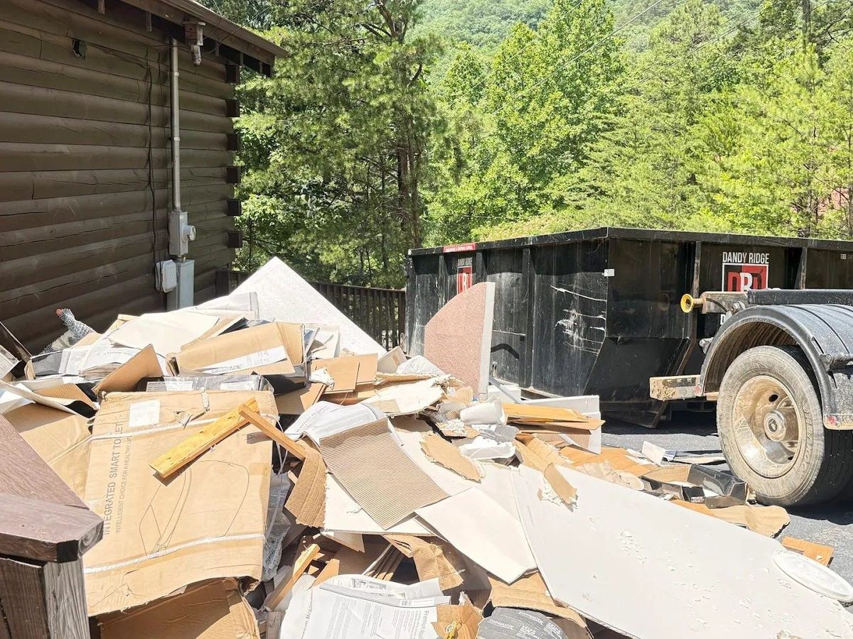 A Dandy Ridge Dumpsters roll-off loaded with construction and remodel debris in Jefferson County, TN.